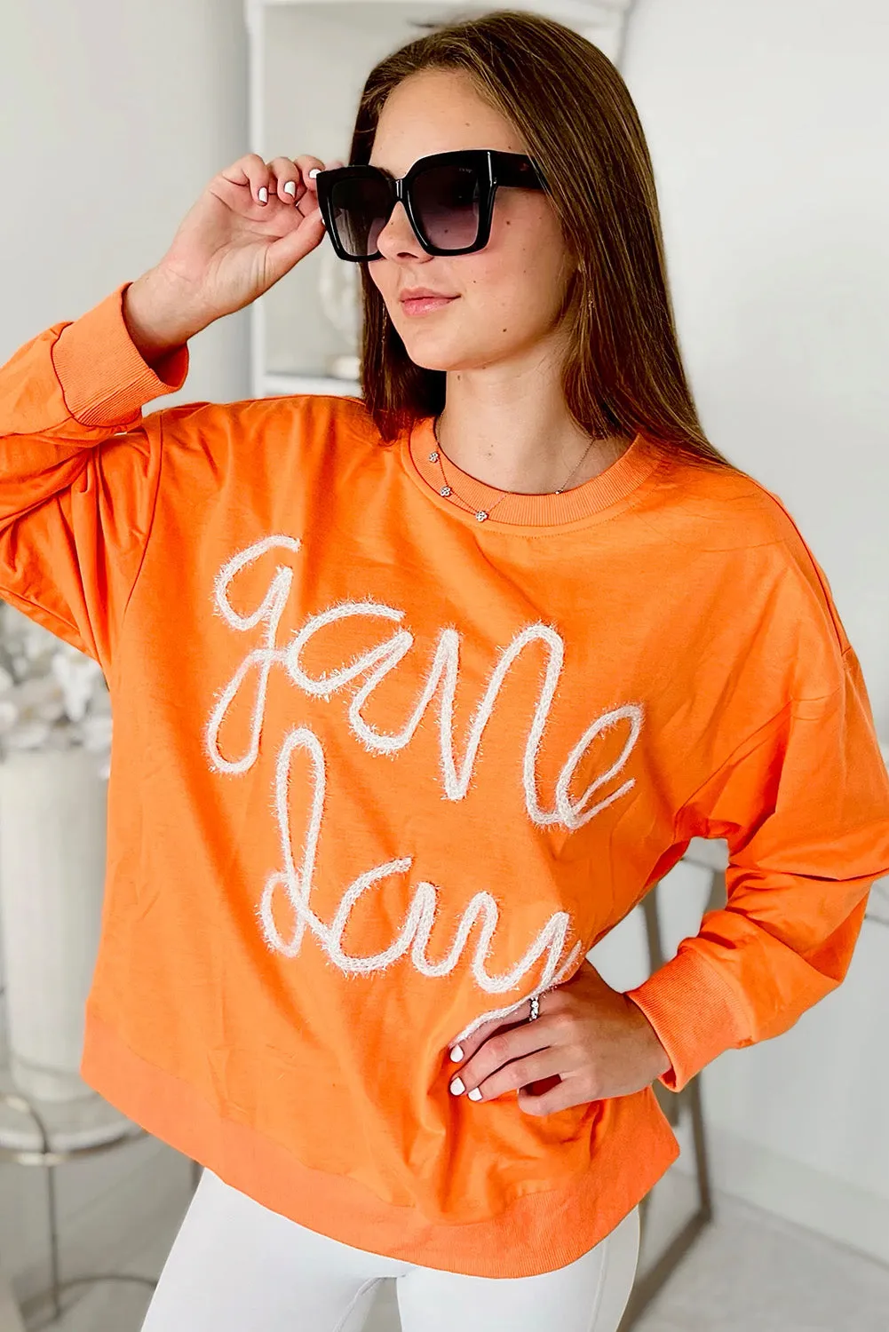 Carrot Contrast Game Day Casual Top with Embroidered Detail
